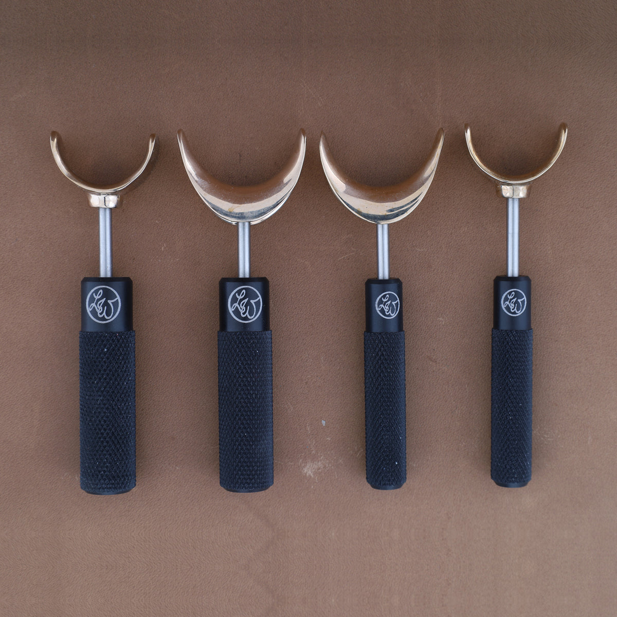 Leather Wranglers SK-3 swivel knives in Black, 3/8 and 1/2 inch barrels, flat and saddle yokes