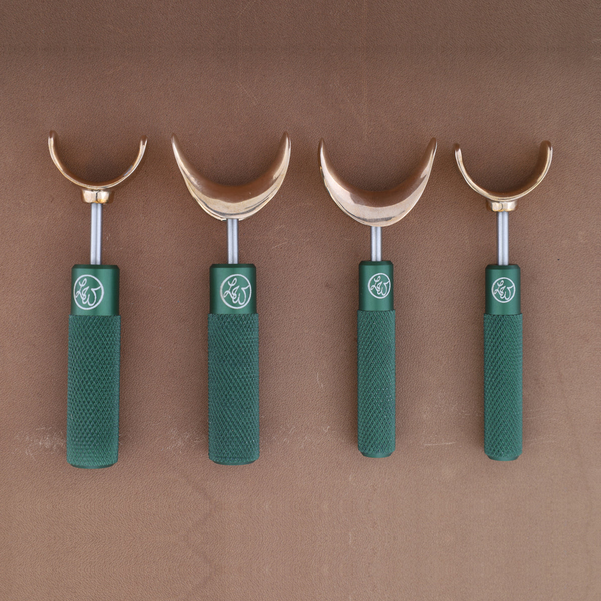 Leather Wranglers SK-3 swivel knives in Green, 3/8 and 1/2 inch barrels, flat and saddle yokes