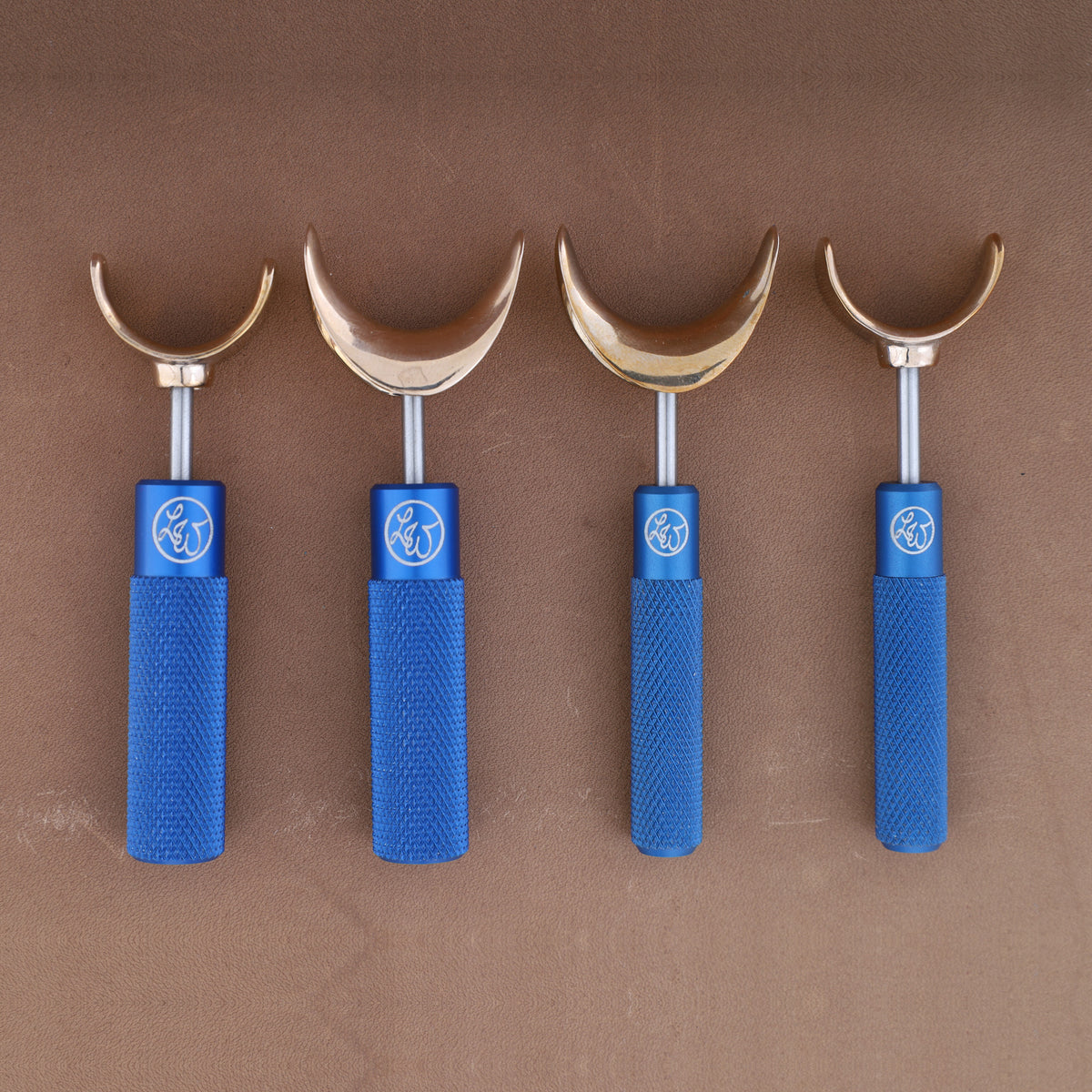 Leather Wranglers SK-3 swivel knives in Royal Blue, 3/8 and 1/2 inch barrels, flat and saddle yokes