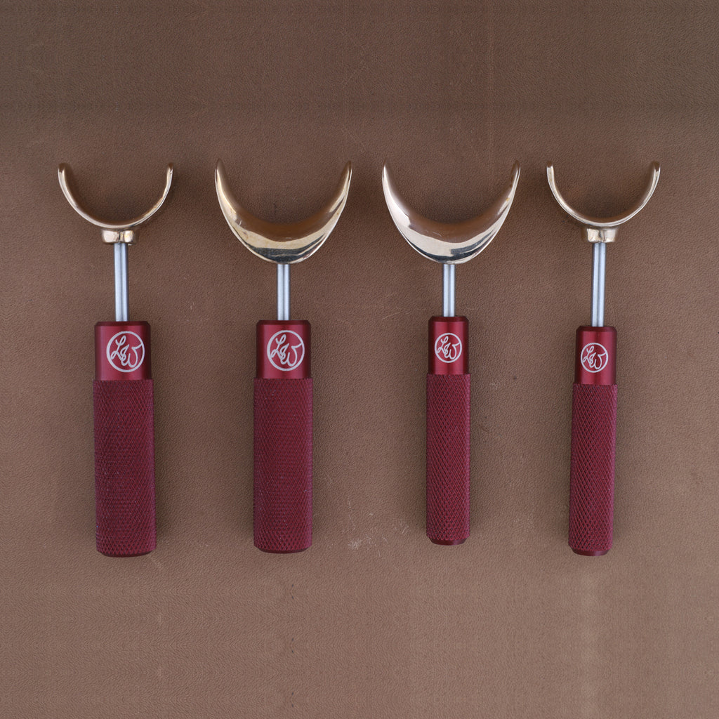 Leather Wranglers SK-3 swivel knives in Red, 3/8 and 1/2 inch barrels, flat and saddle yokes