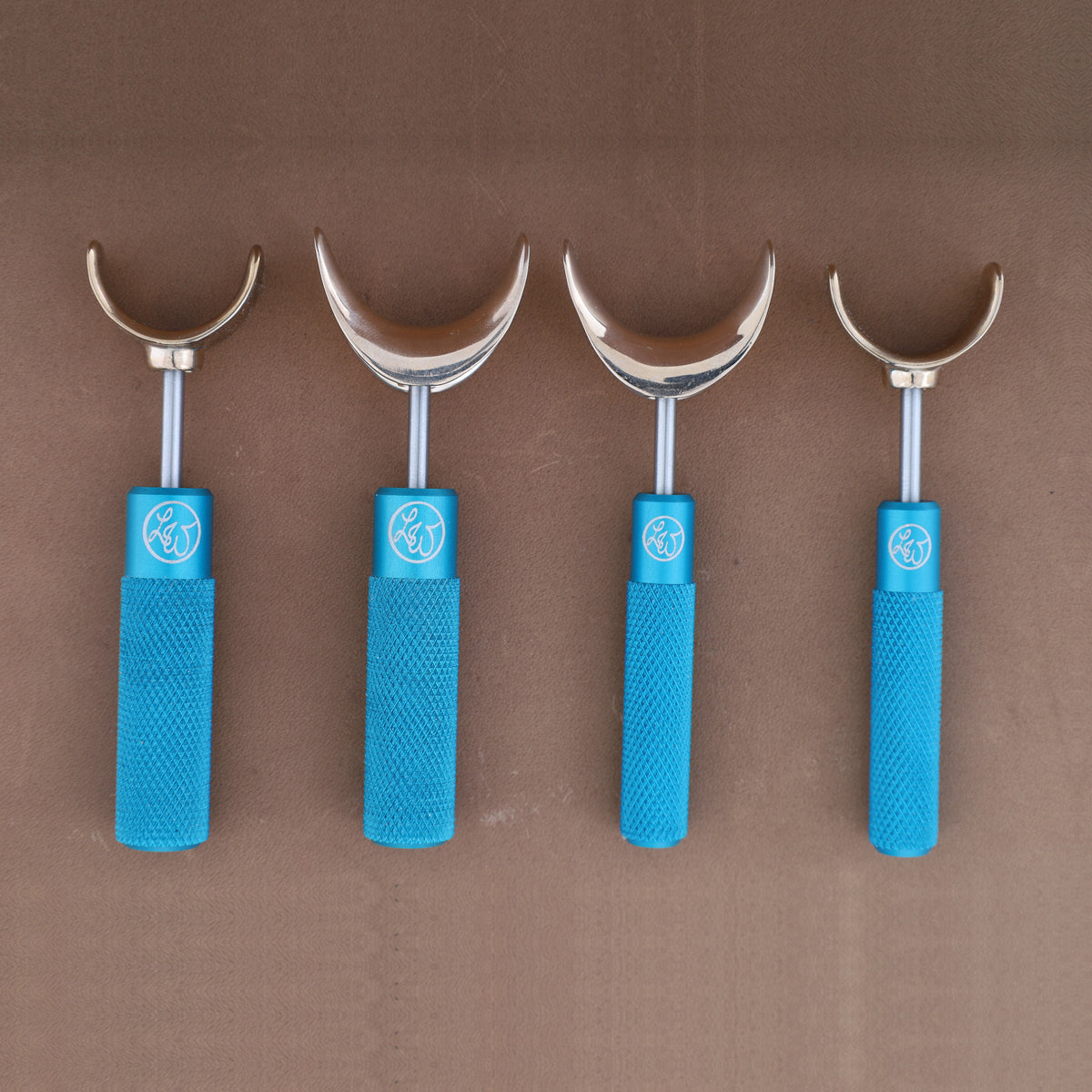 Leather Wranglers SK-3 swivel knives in Turquoise, 3/8 and 1/2 inch barrels, flat and saddle yokes