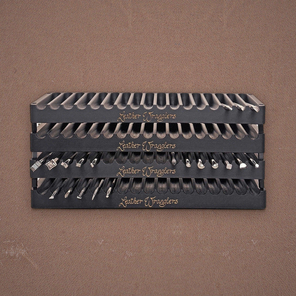Stacked Leather Wranglers Tools Trays holding stamping tools